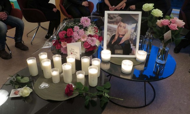 Alexandra Mezher, 22, a Swedish social worker who was allegedly stabbed to death by a 15-year-old asylum seeker at a shelter for refugee children. Gothenburg, Sweden. Candles and floral tributes and photo of Alexandra Mezher at a memorial service for the murdered girl in her home town of Boras today.